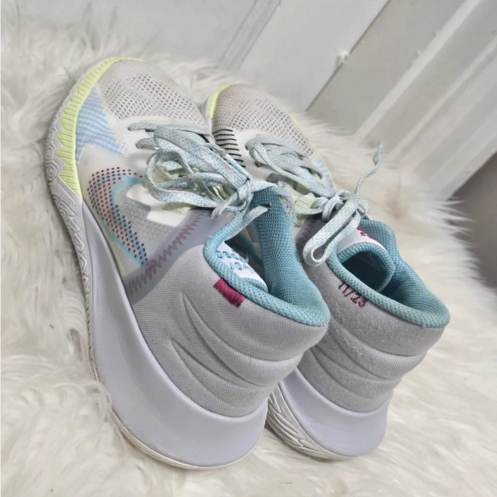 Nike Kyrie Flytrap 5 basketball shoes in the '1 World 1 People' colorway.